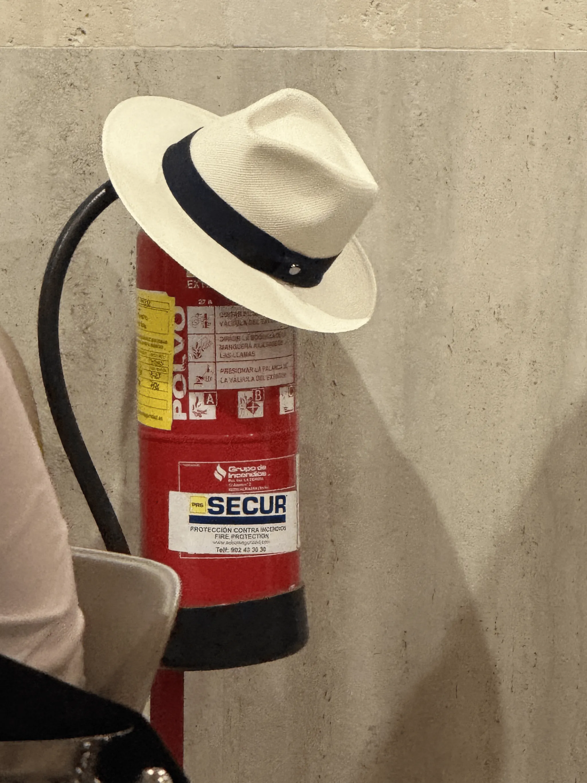 Hat on a fire extinguisher in Cordoba, Spain